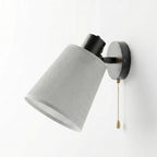 adjustable wall light featuring a classic coolie Metal lampshade