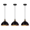 Three vintage industrial pendant lights with black metal shades