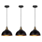 Three vintage industrial pendant lights with black metal shades