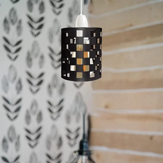 A black metal pendant light with a cylindrical cage design and square cutouts