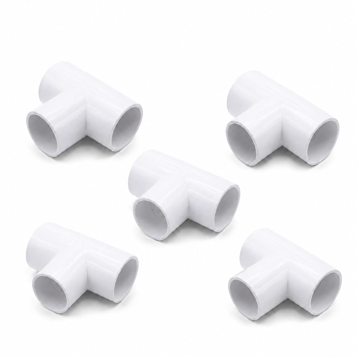 five white PVC 3-way pipe tee connectors