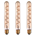 T185 E27 LED filament bulb, amber glass, spiral filament, lit, three bulbs on a white background