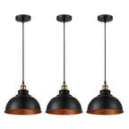 Three black vintage industrial pendant lights with metal shades