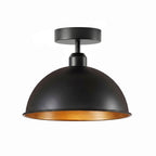industrial-style, semi-flush mount ceiling light with a black dome shade and a gold/brass interior finish