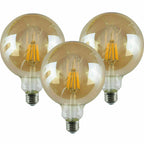 G125 E27 LED filament bulb, amber glass, unlit, three bulbs on a white background