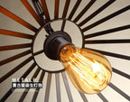 Vintage-style light bulb in a decorative metal fixture