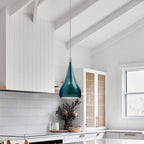 Cyan Blue Teardrop Pendant Light with elegant modern design and adjustable cable. Ideal for kitchens, dining rooms and contemporary interiors.