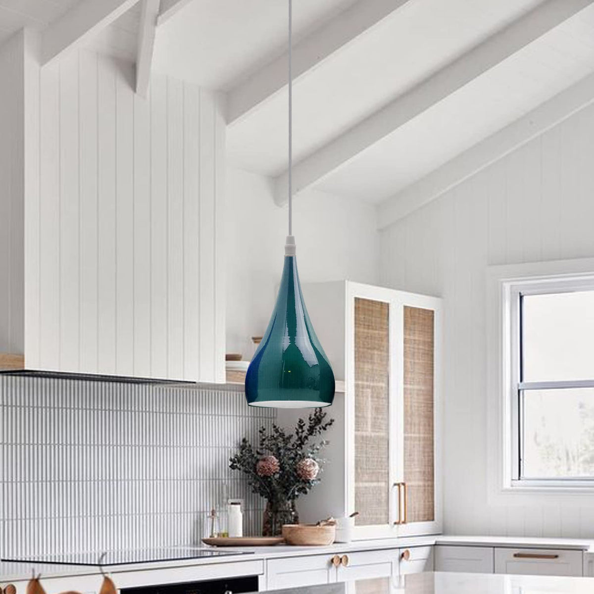 Cyan Blue Teardrop Pendant Light with elegant modern design and adjustable cable. Ideal for kitchens, dining rooms and contemporary interiors.