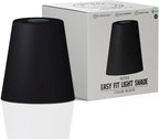 A black metal shade sits next to its white packaging.