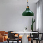 A green vintage hemp rope pendant light hangs unlit in a dining area.