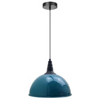 A blue pendant light hangs from a ceiling with a black cord and fitting, unlit, on a white background.